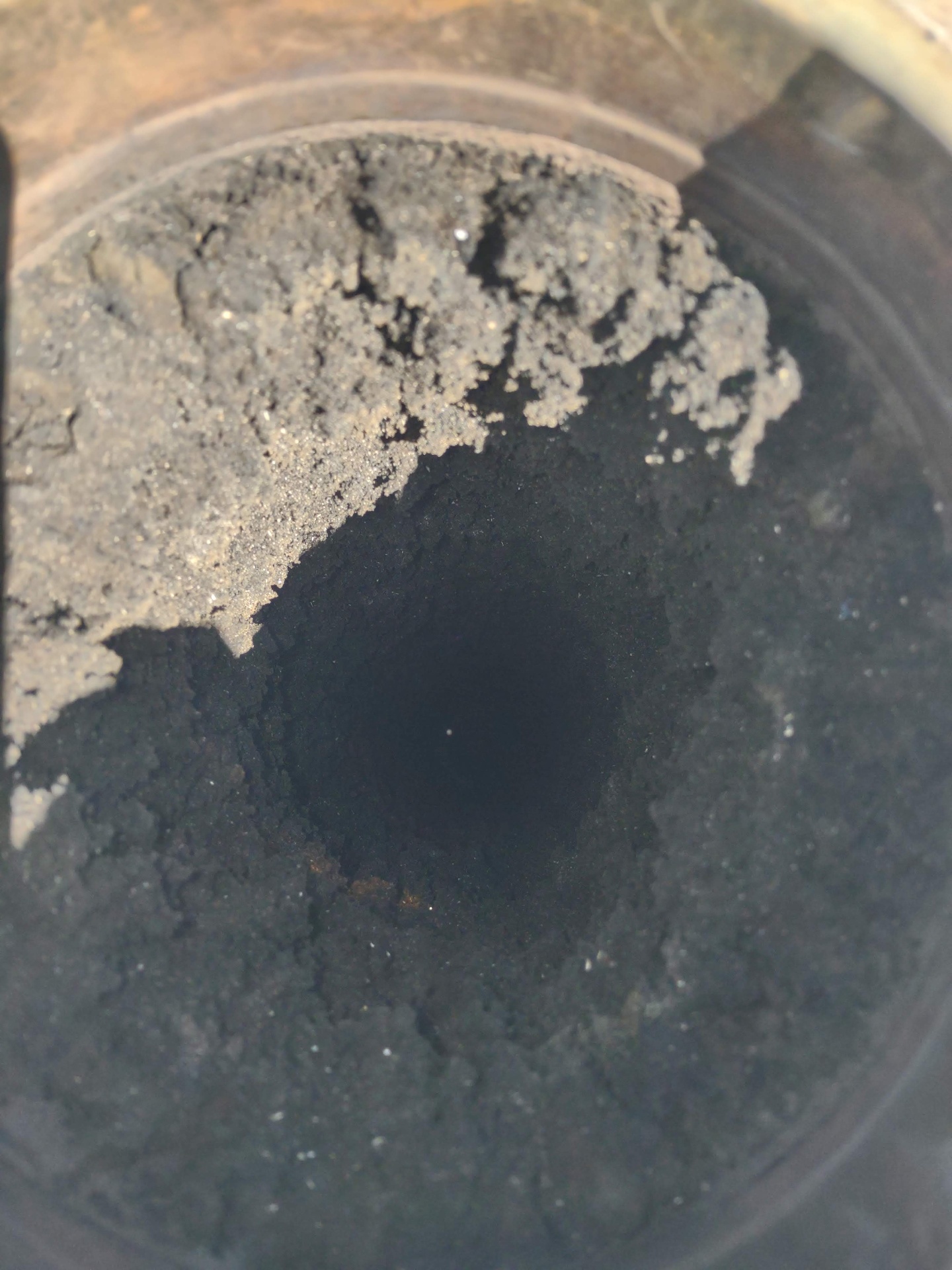 Chimney before cleaning - creosote buildup