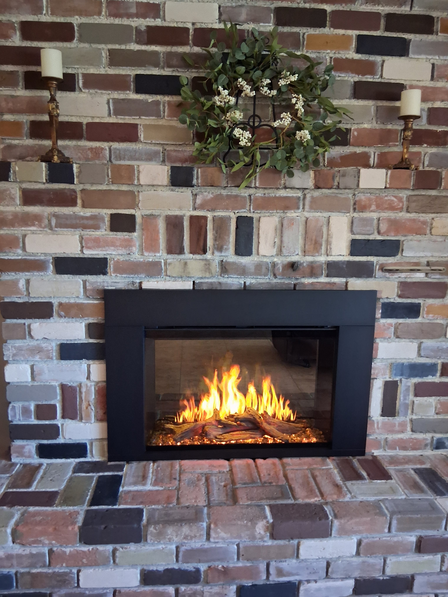 Modern Flames electric fireplace insert installed in brick fireplace in Prescott AZ