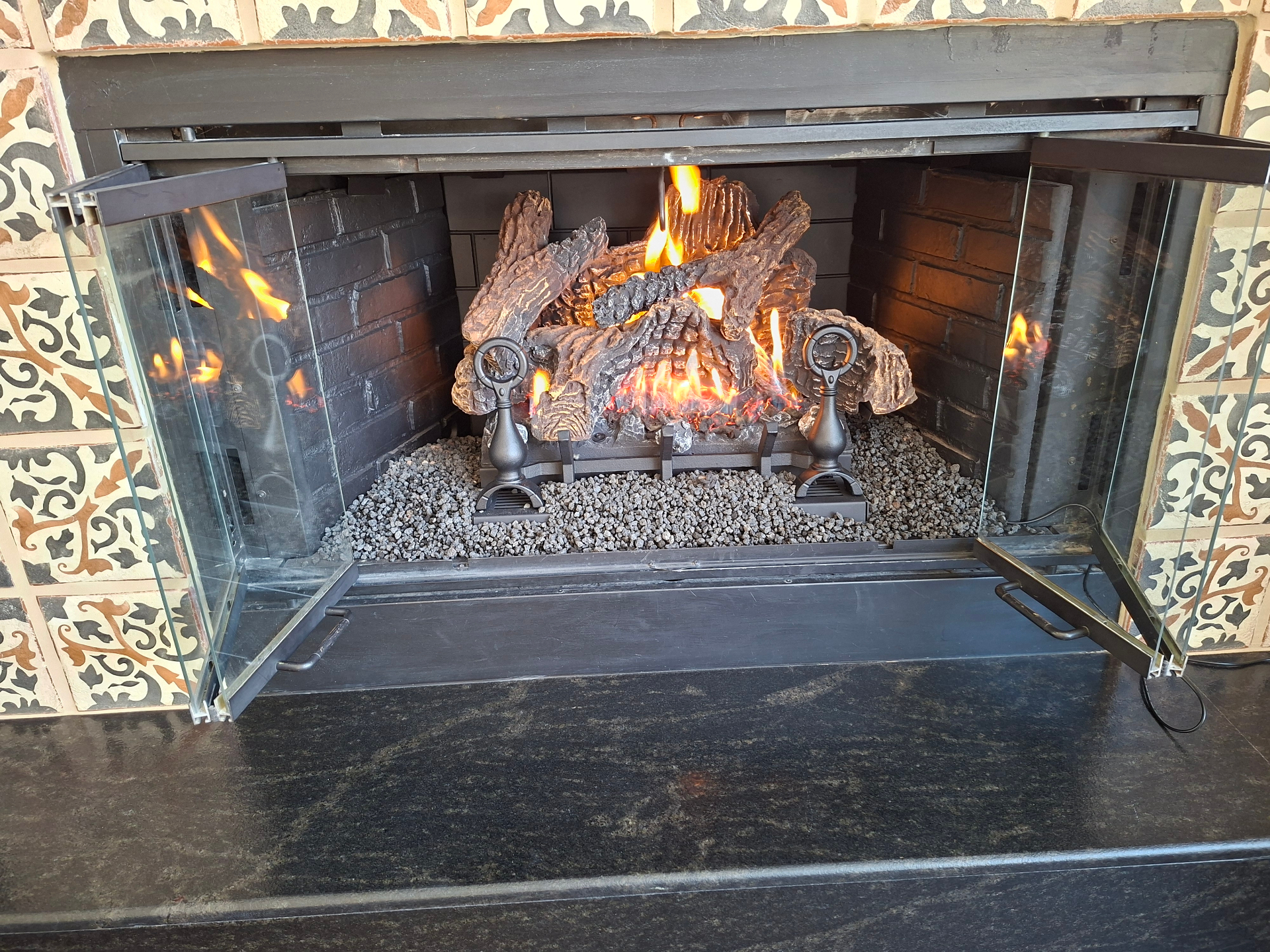 Napoleon Fiberglow gas log set installed in a Prescott AZ fireplace